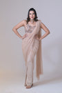 Beige crop top with cutdana palla work and lycra saree drape