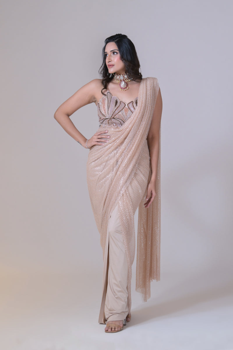 Beige crop top with cutdana palla work and lycra saree drape