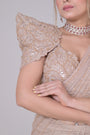 Beige crop top with cutdana palla work and lycra saree drape