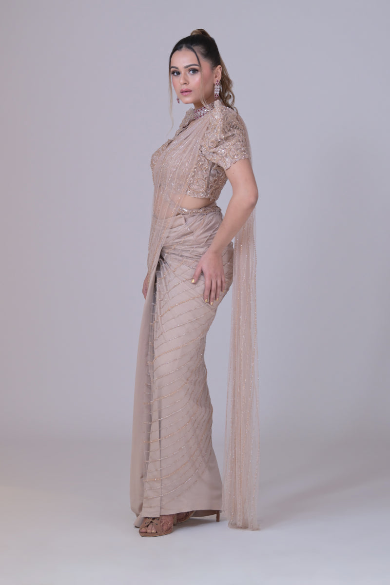 Beige crop top with cutdana palla work and lycra saree drape