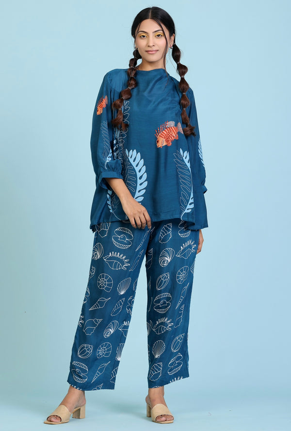 Blue print top with coral outline print matching blue straight pant