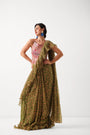 The Ezra Jhilmil saree set in avacado green with rani ambi blouse