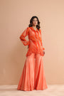 Tequila sunrise tunic with exaggerated bell-bottoms.