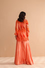 Tequila sunrise tunic with exaggerated bell-bottoms.