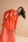 Tequila sunrise tunic with exaggerated bell-bottoms.