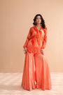 Tequila sunrise tunic with exaggerated bell-bottoms.