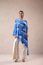 Atlantic Blue cruise cape with creme fall pants.