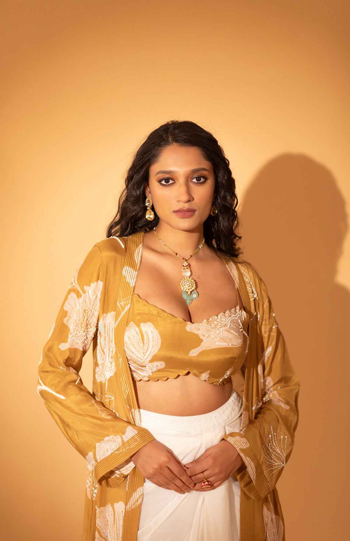 A Embroidered Jacket Set With Bustier And Drape Skirt