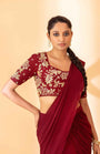 A Maroon Fish Cut Style Saree With Embroidered Blouse