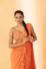 A Rust Pre-Draped Saree With Hand Embroidered Blouse