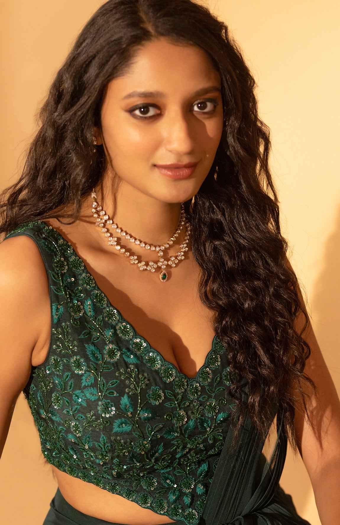 A Bottle Green Saree Set Paired With Embroidered Blouse