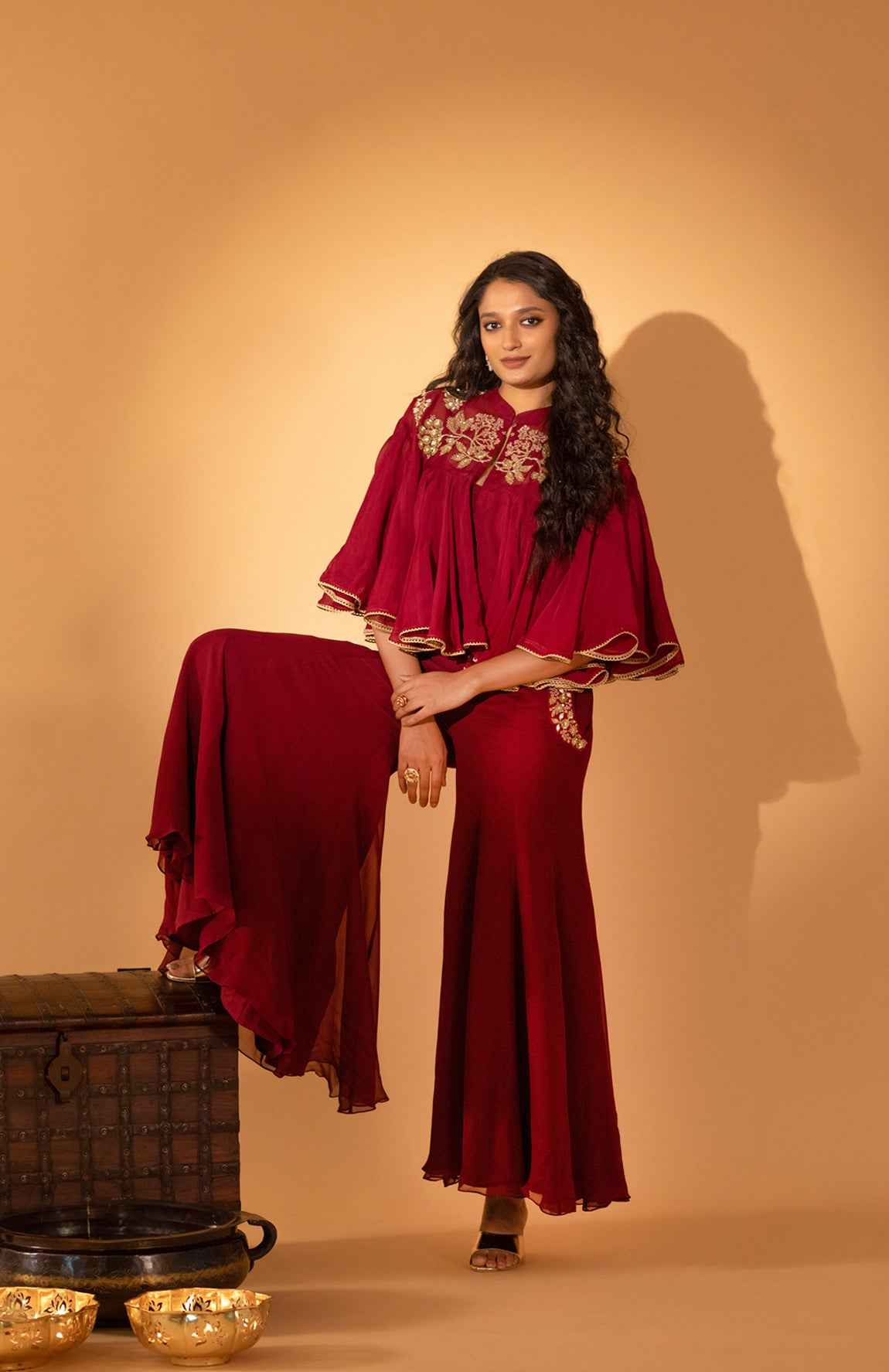 A Jumpsuit With Embroidered Cape