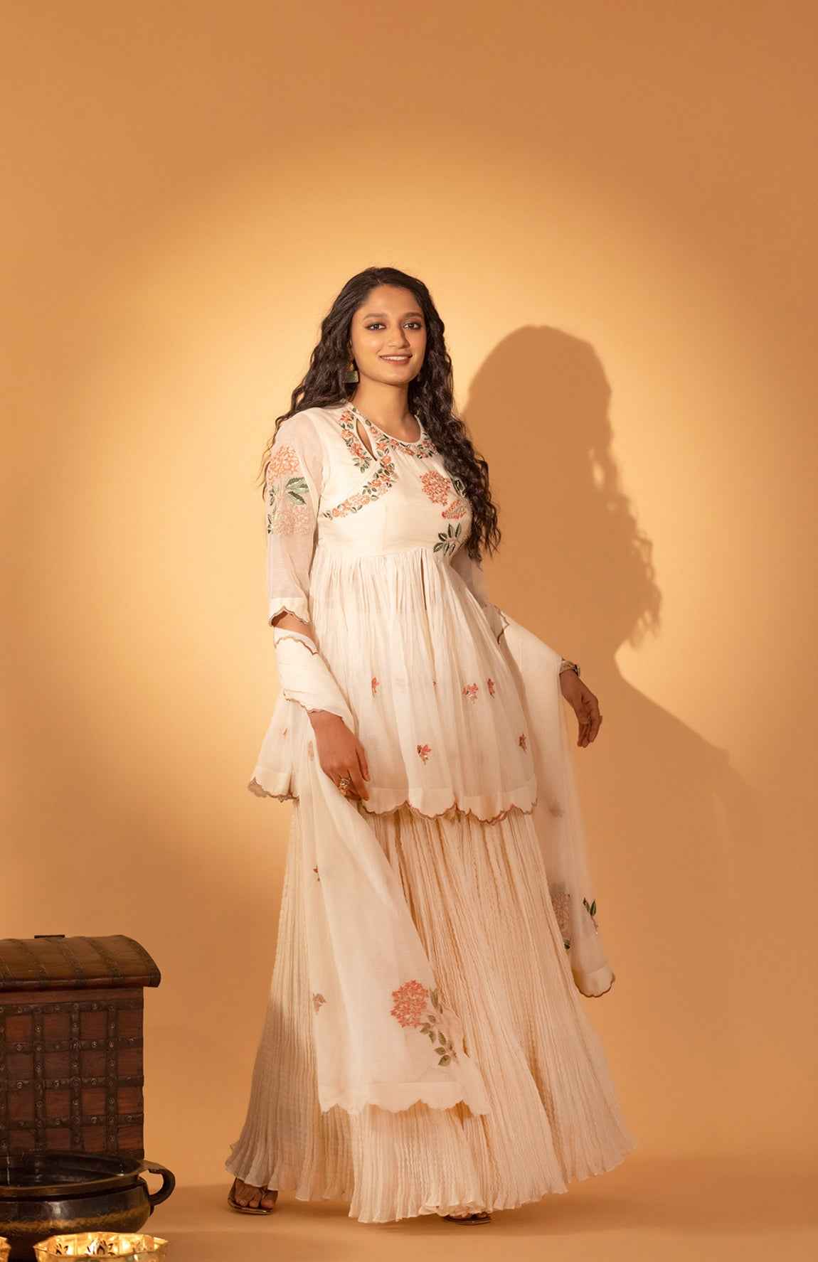 A Skirt Set With Embroidered Peplum And Duptta