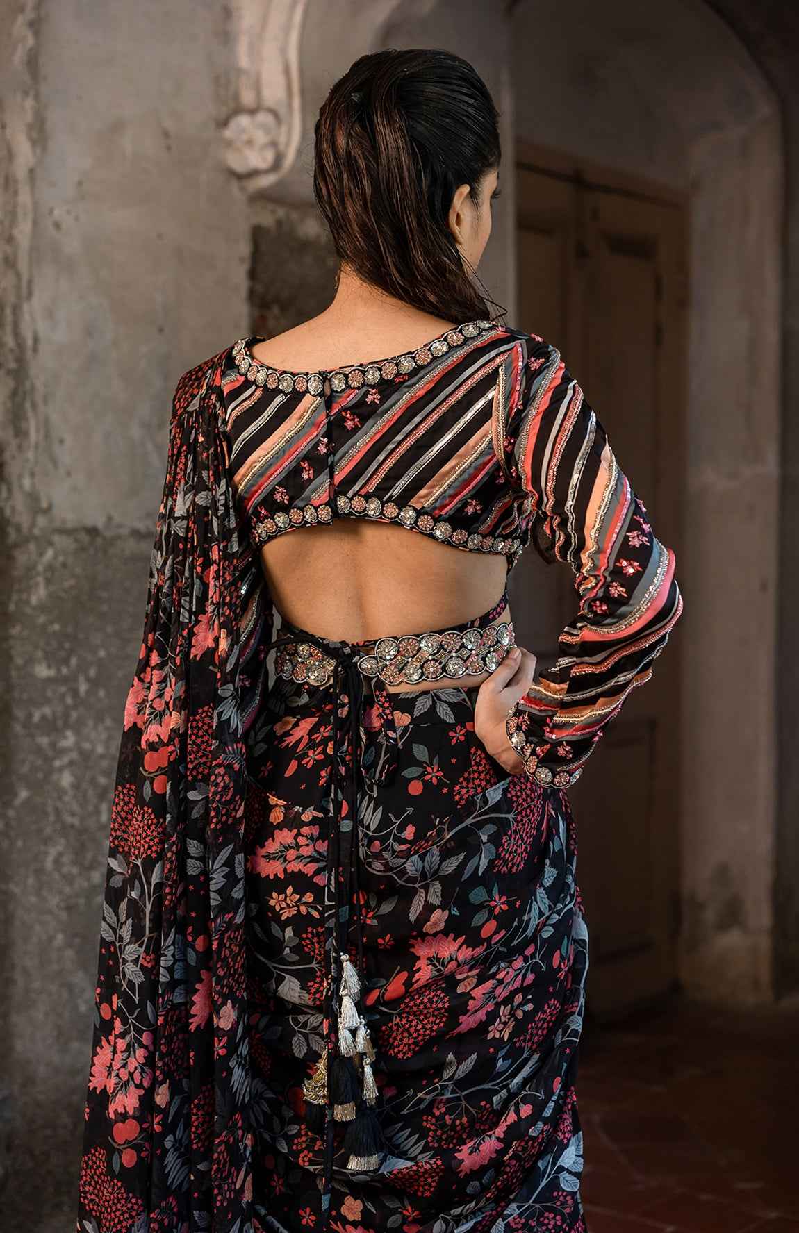 A Pre-Draped Layer Saree With Hand Embroidered Blouse And Belt