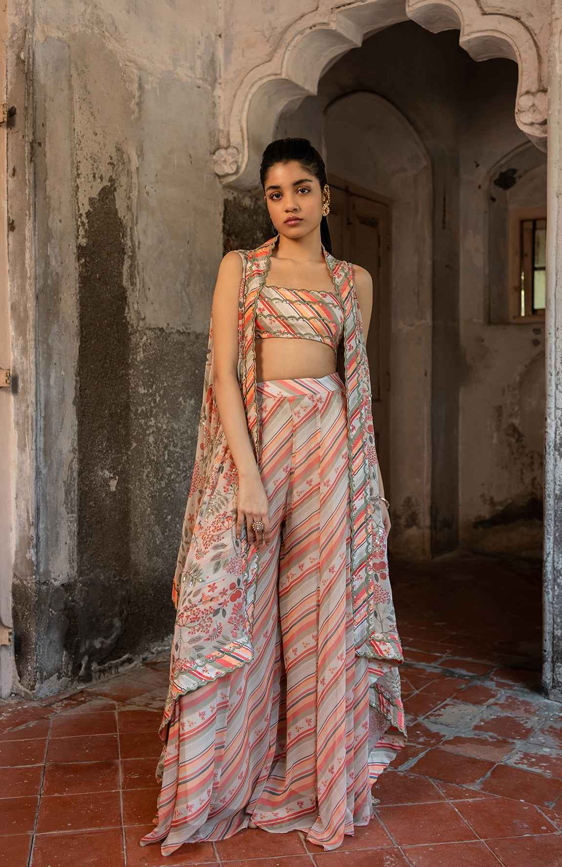 A Hand Embroidered Cape Set Paired With Tube And Pants.