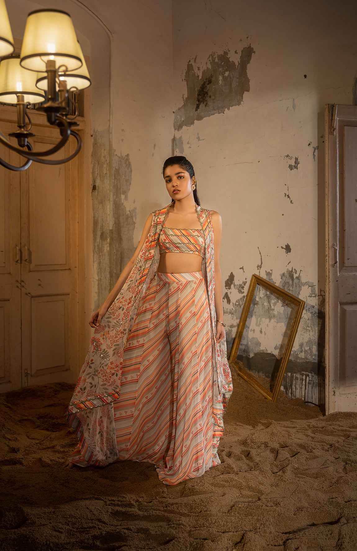 A Hand Embroidered Cape Set Paired With Tube And Pants.