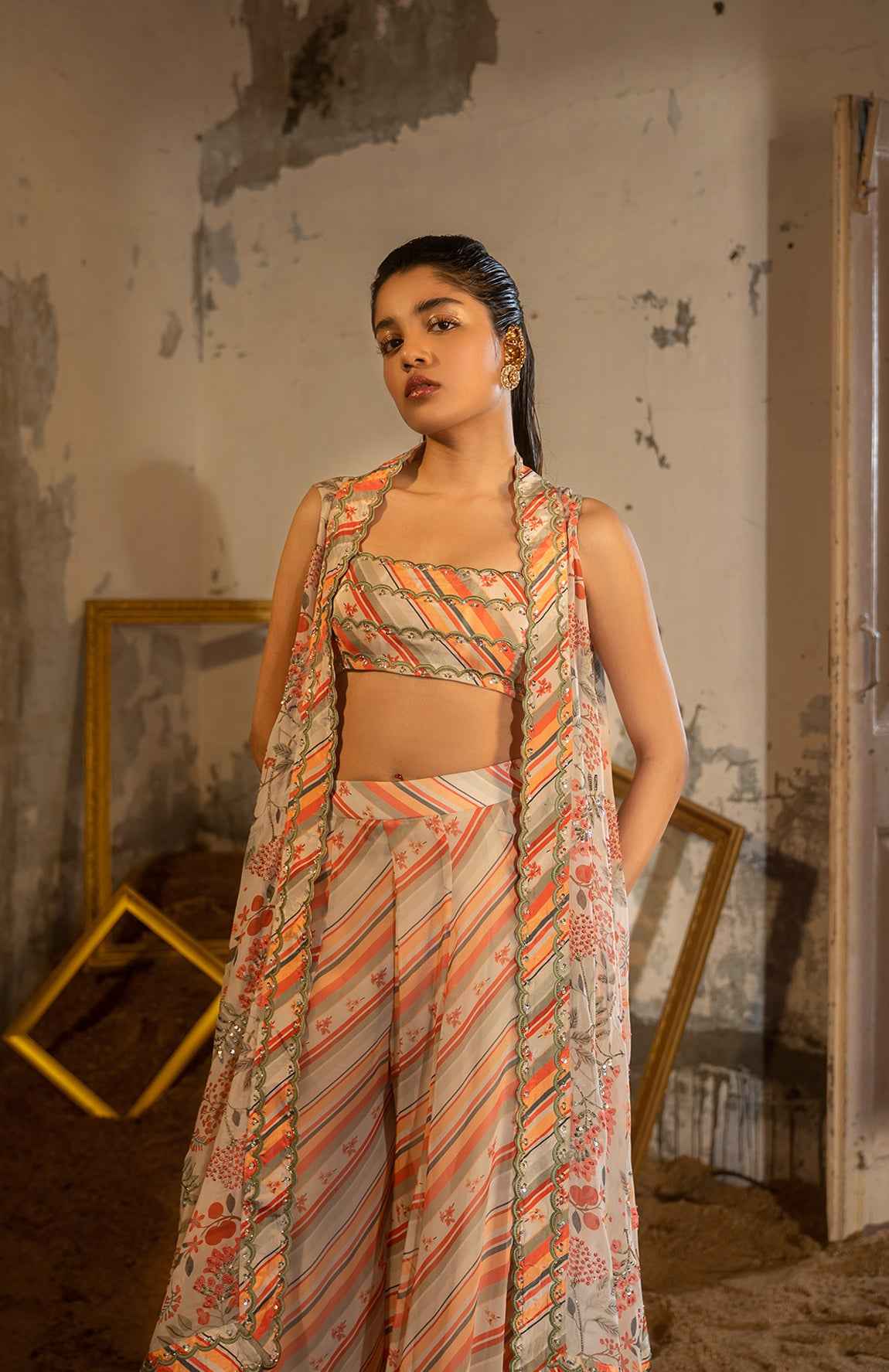 A Hand Embroidered Cape Set Paired With Tube And Pants.