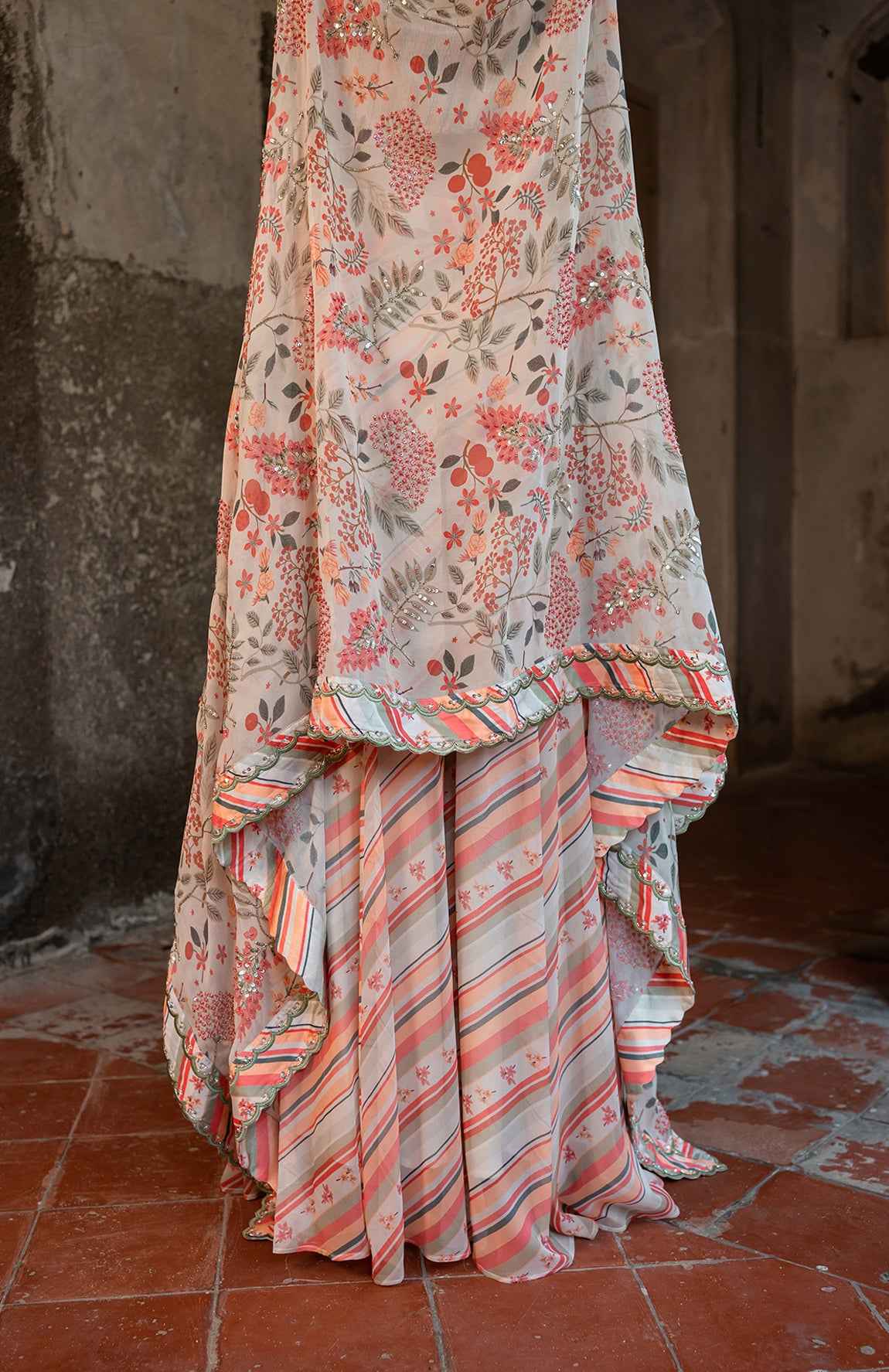 A Hand Embroidered Cape Set Paired With Tube And Pants.