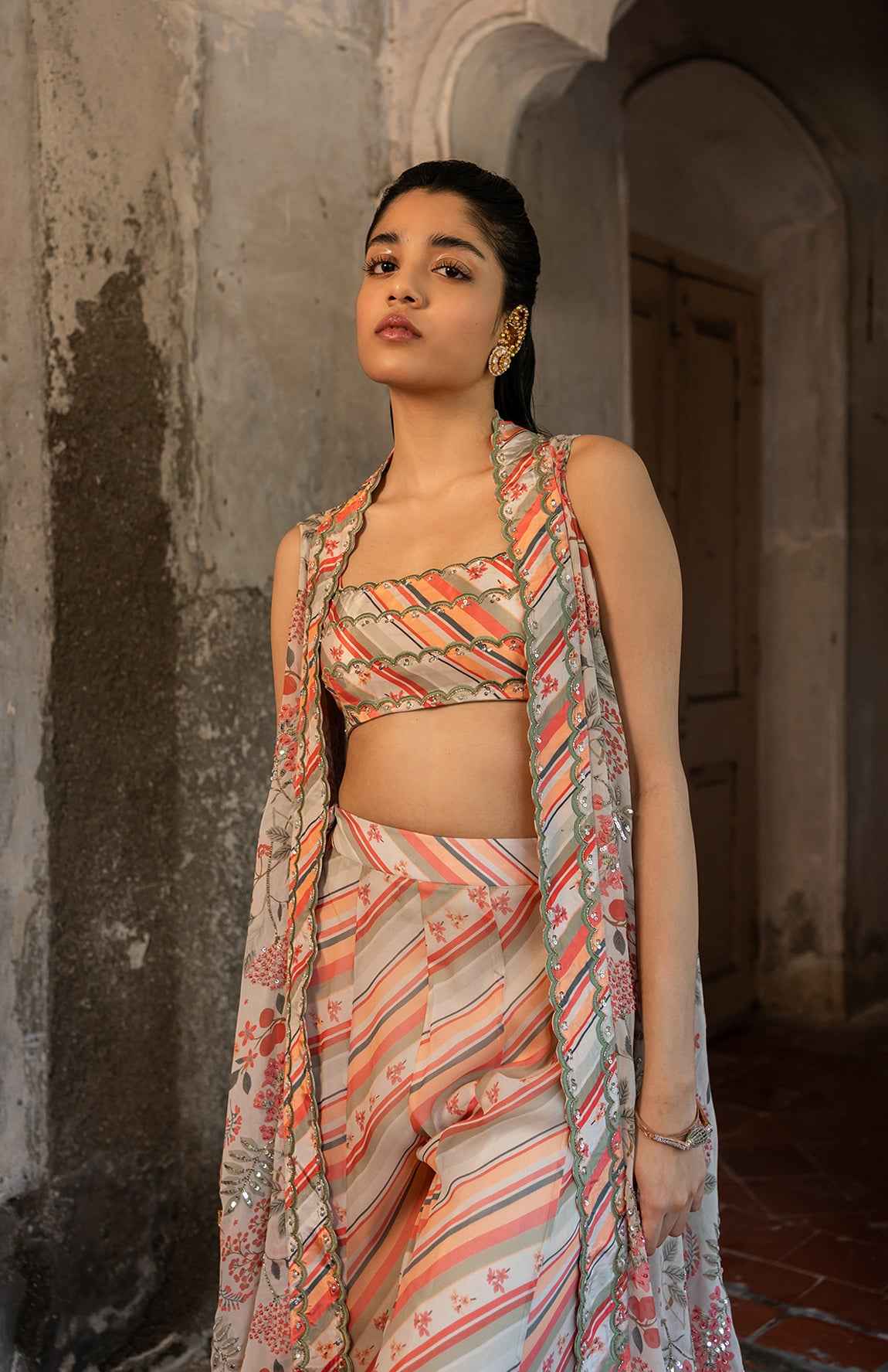 A Hand Embroidered Cape Set Paired With Tube And Pants.