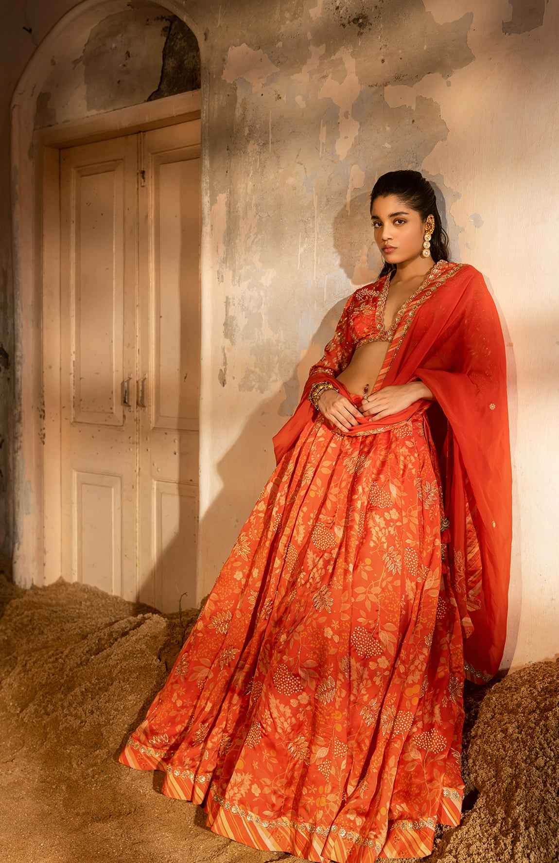 A Tommato Red Embroidered Lehenga With V Neck Blouse And Duptta