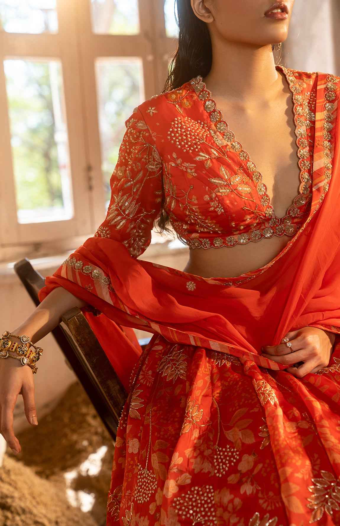 A Tommato Red Embroidered Lehenga With V Neck Blouse And Duptta