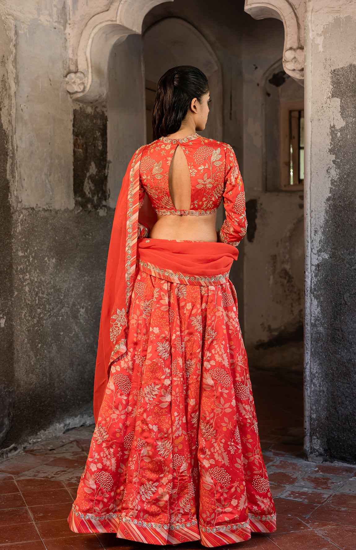 A Tommato Red Embroidered Lehenga With V Neck Blouse And Duptta