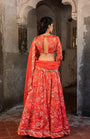 A Tommato Red Embroidered Lehenga With V Neck Blouse And Duptta
