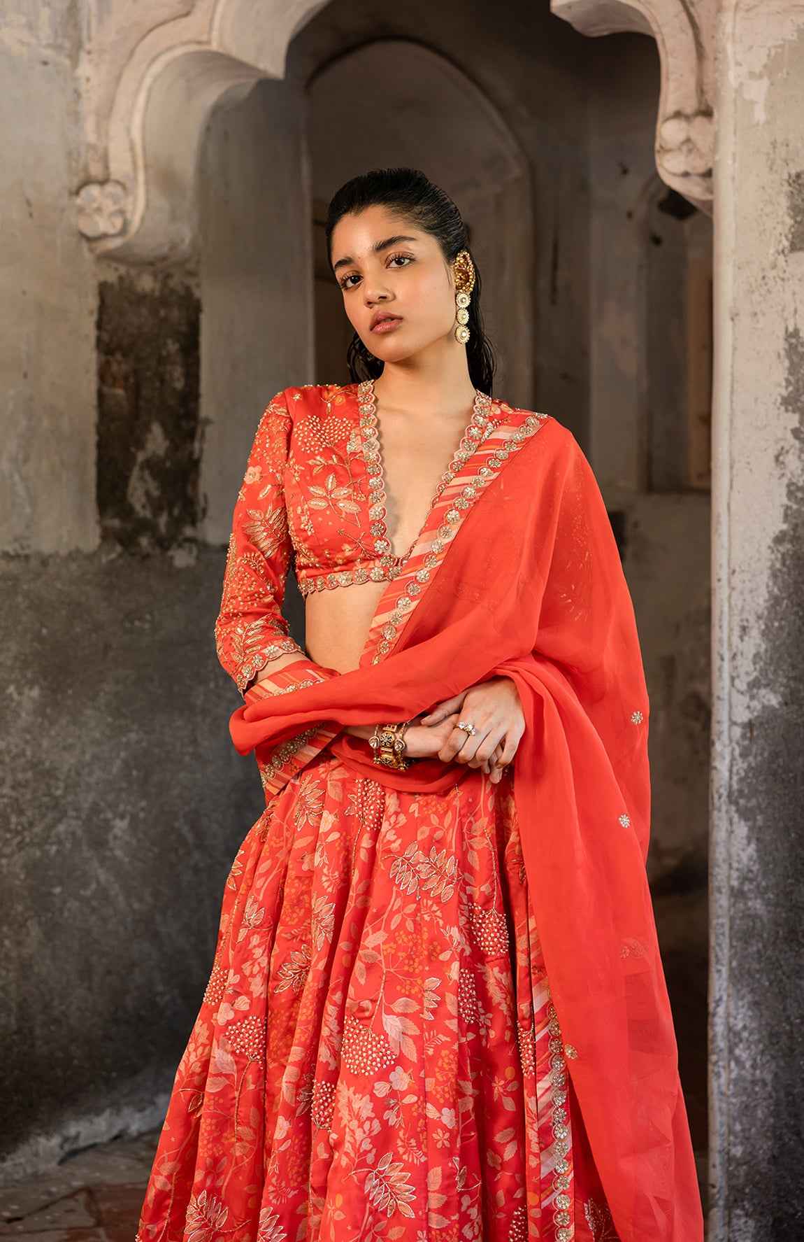 A Tommato Red Embroidered Lehenga With V Neck Blouse And Duptta
