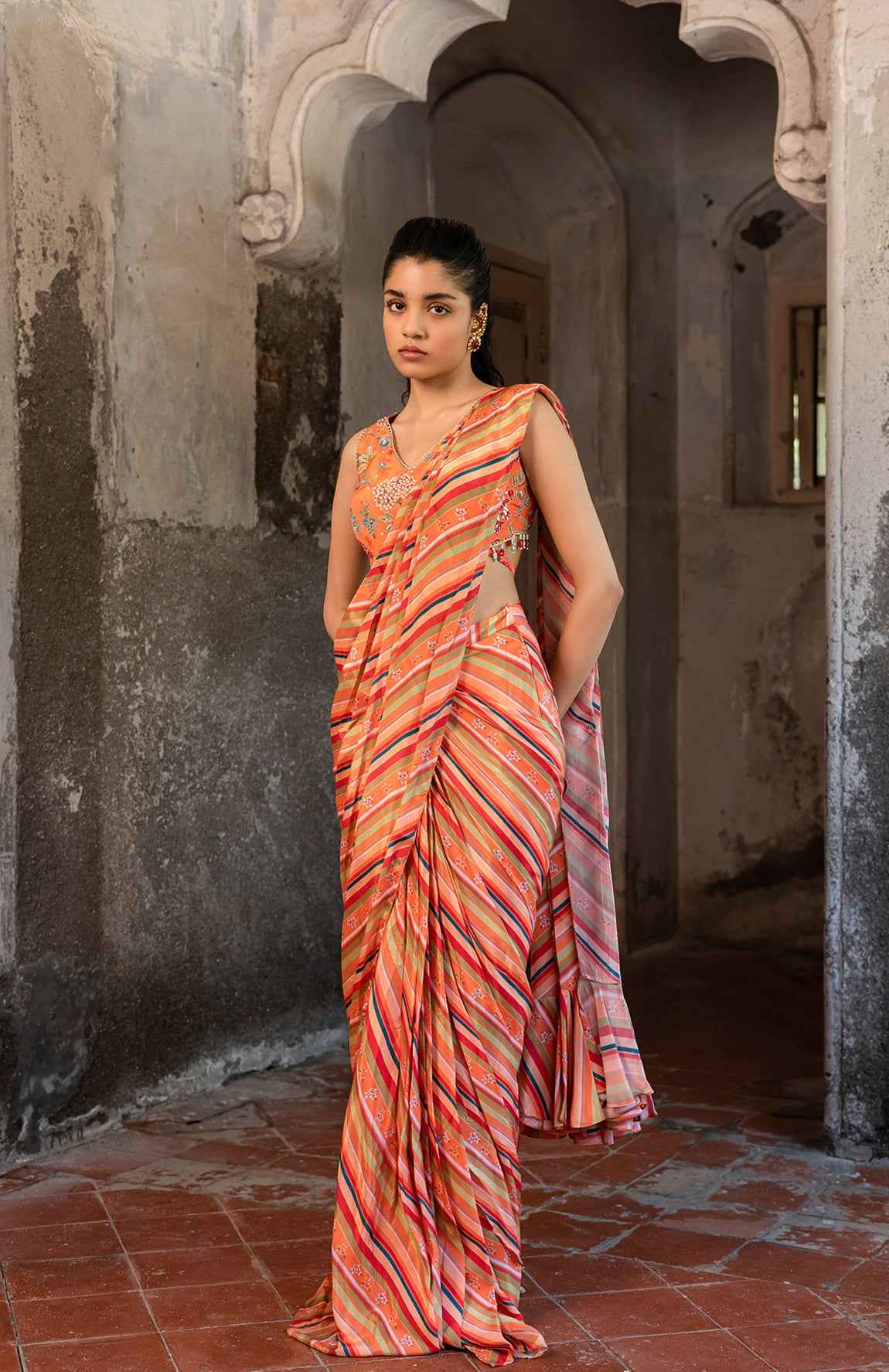 A Pre-Draped Saree Set With Hand Embroidered Blouse