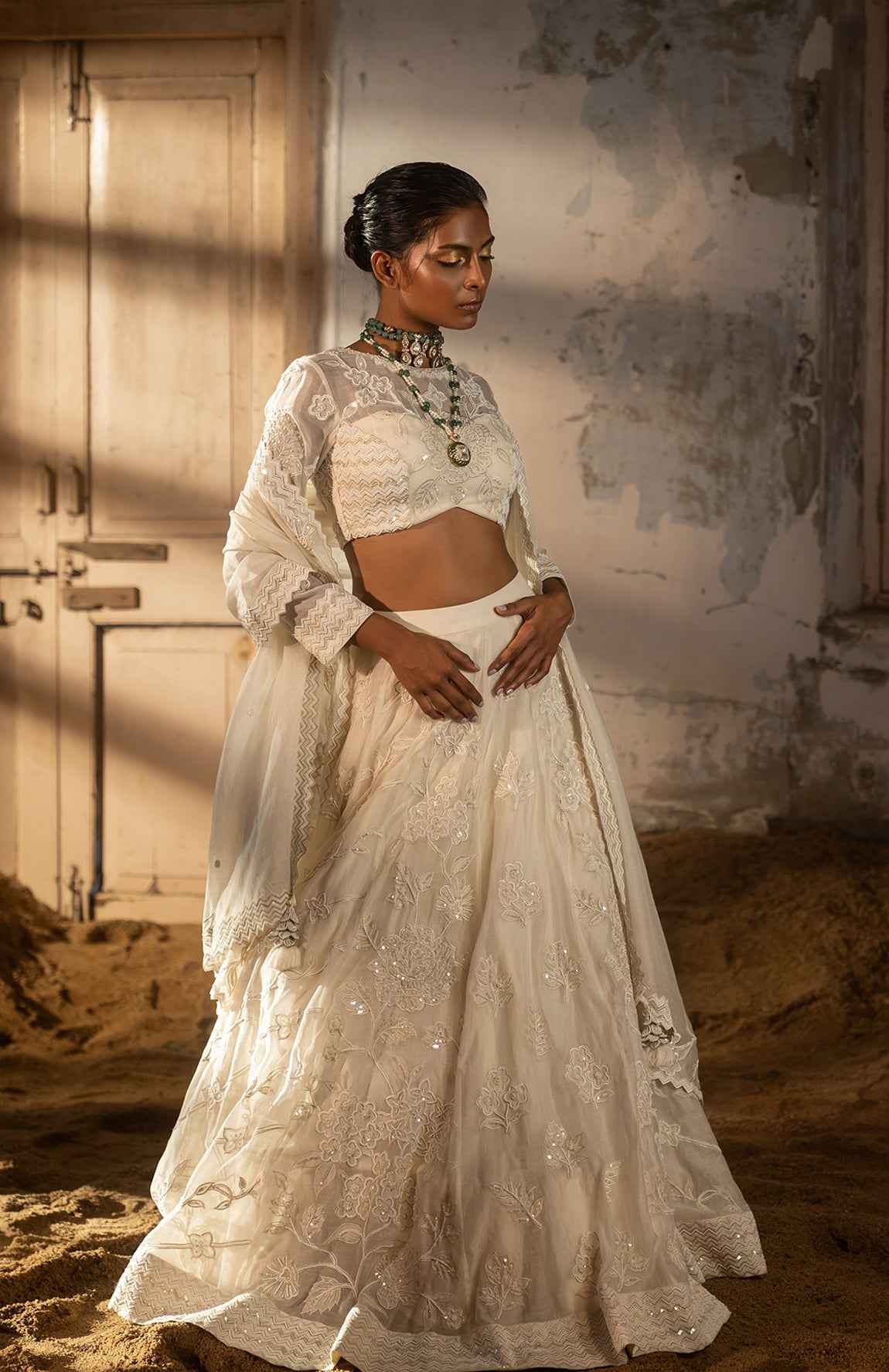 A Hand Embroidered Lehenga Set Paired With Blouse And Duptta