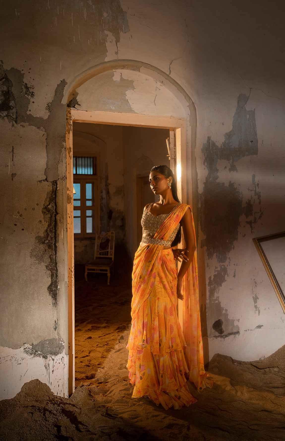 A Pre-Draped Layer Saree With Hand Embroidered Blouse And Belt
