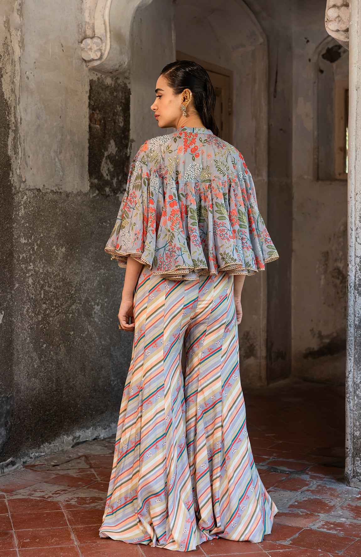 A Jumpsuit Paired With Hand Embroired Cape