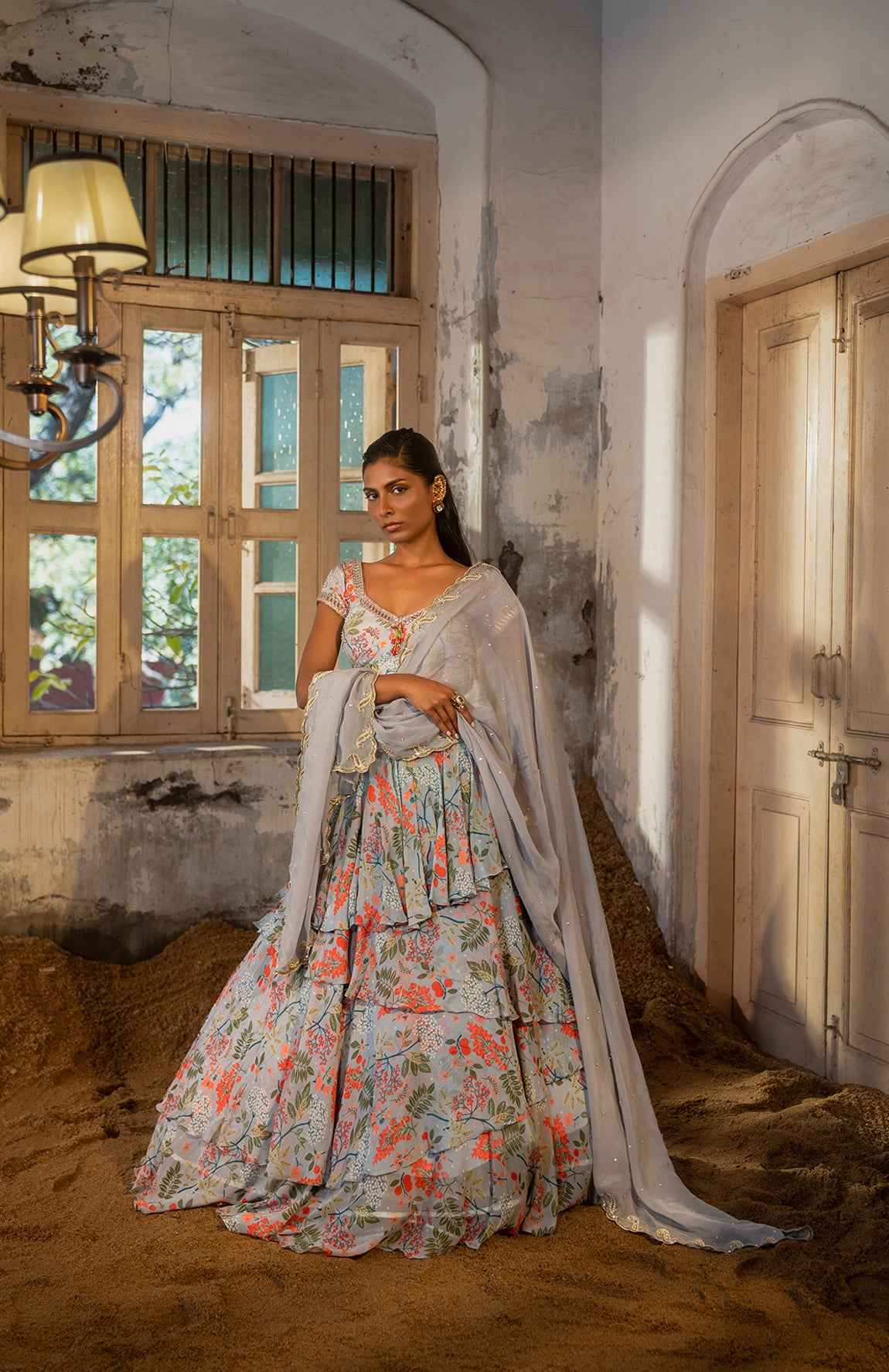 A Printed Embroidered Layered Lehenga Set Paired With Blouse And Duptta