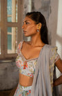 A Printed Embroidered Layered Lehenga Set Paired With Blouse And Duptta