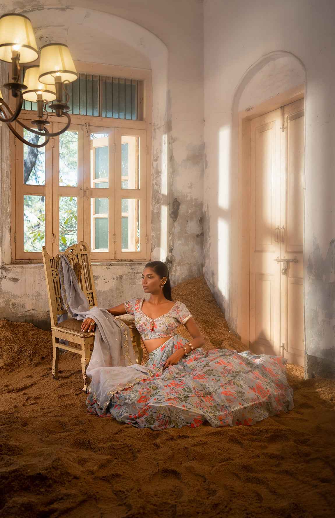 A Printed Embroidered Layered Lehenga Set Paired With Blouse And Duptta