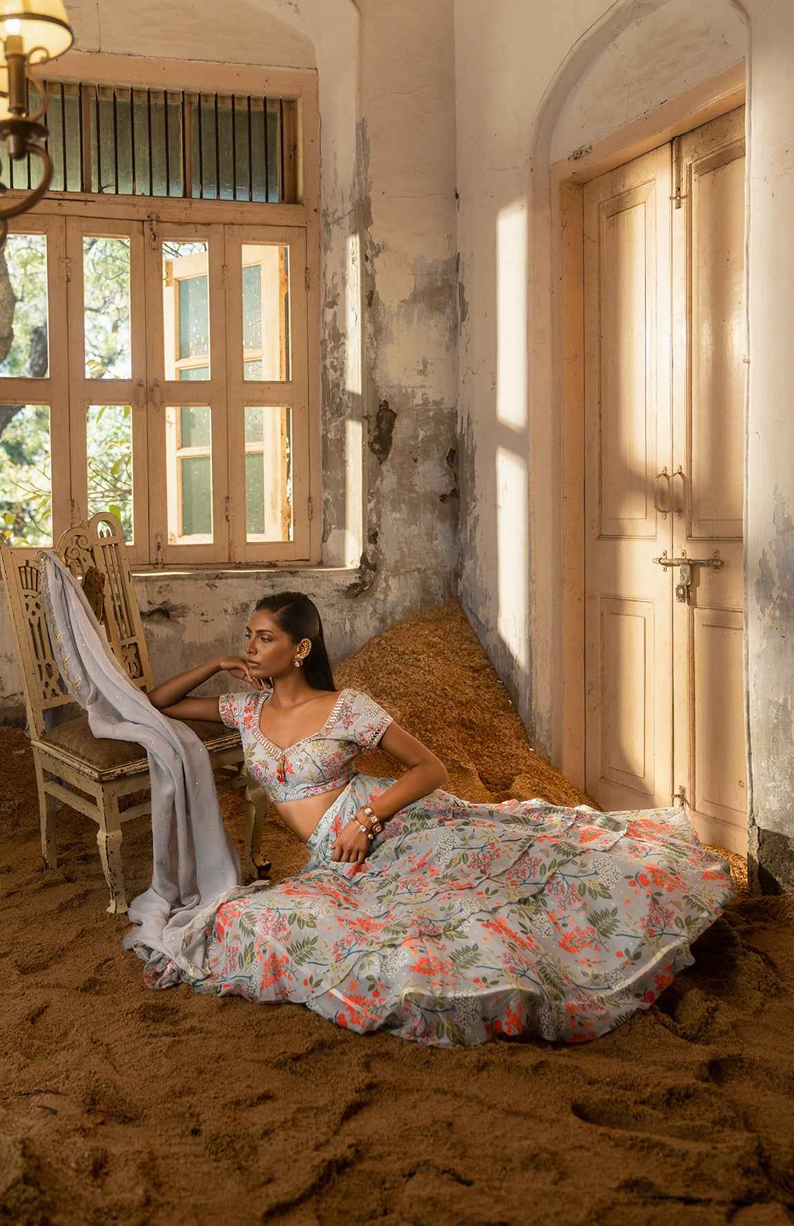 A Printed Embroidered Layered Lehenga Set Paired With Blouse And Duptta