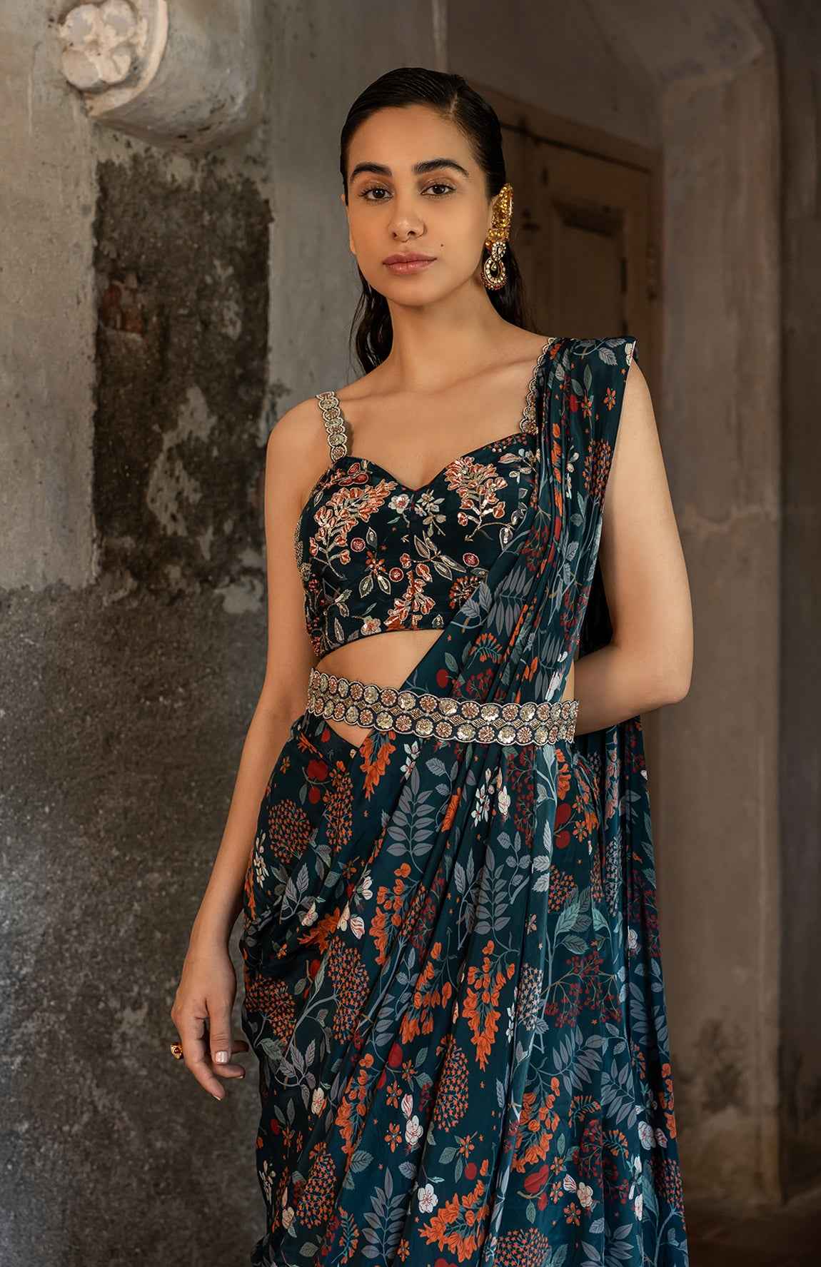 A Draped Indo Western Saree Set Paired With Bustier And Style With Belt