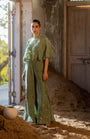 A Pista Green Cape With Side Cut Pant And Bustier