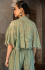 A Pista Green Cape With Side Cut Pant And Bustier