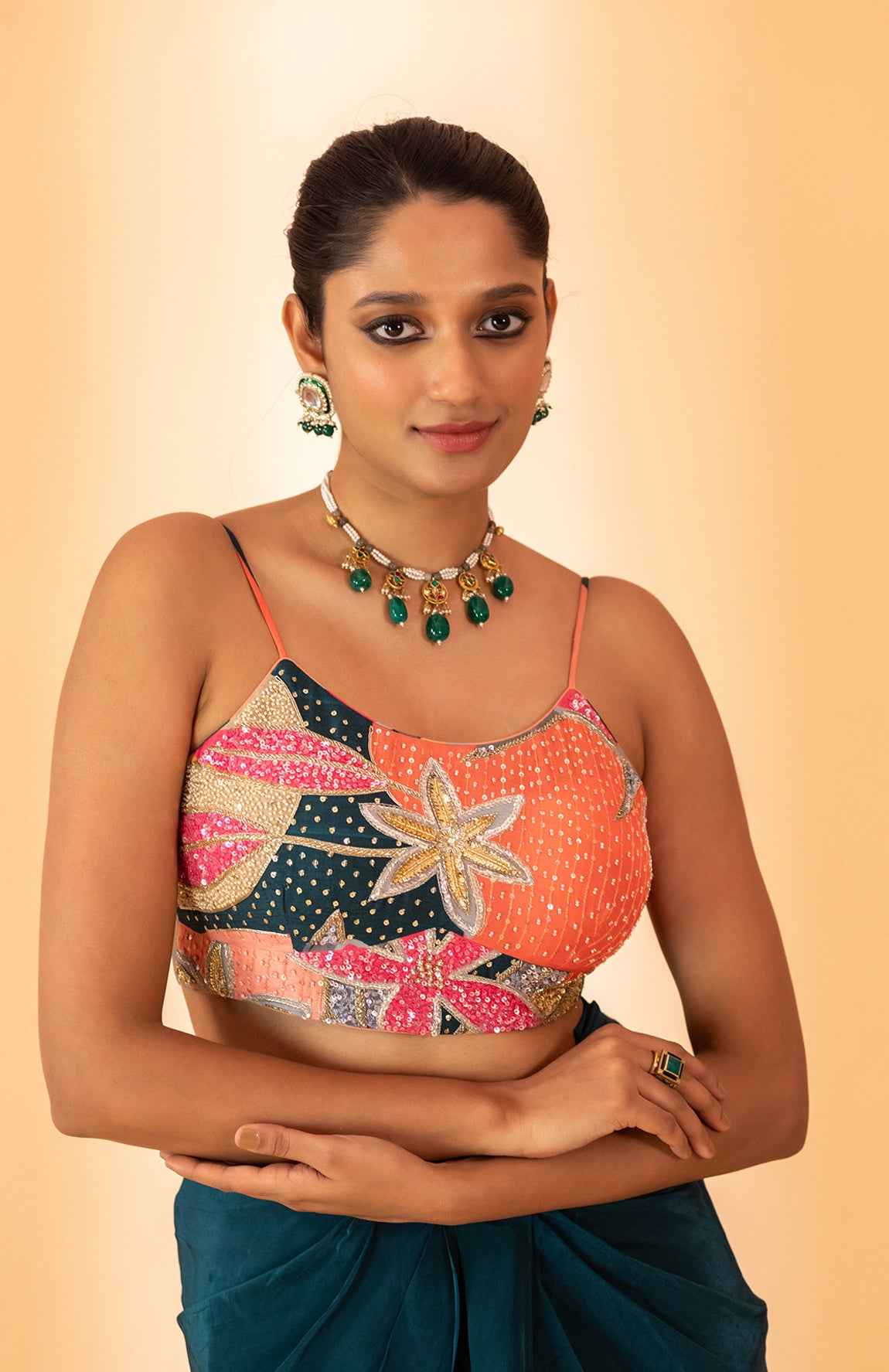 A Multi Color Embroidered Jacket Set Paired With Bustier And Drape Skirt