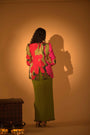 A Multi Color Embroidered Jacket Set Paired With Bustier And Drape Skirt