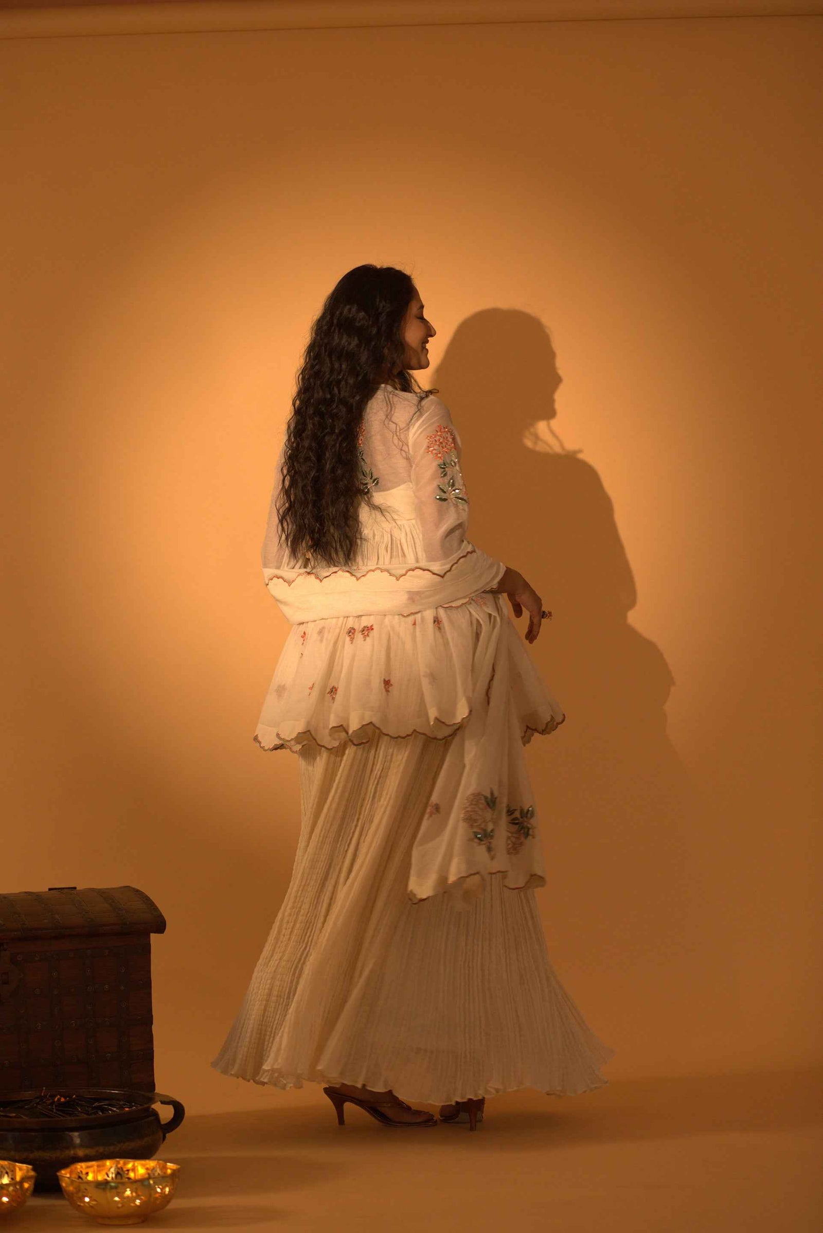 A Skirt Set With Embroidered Peplum And Duptta