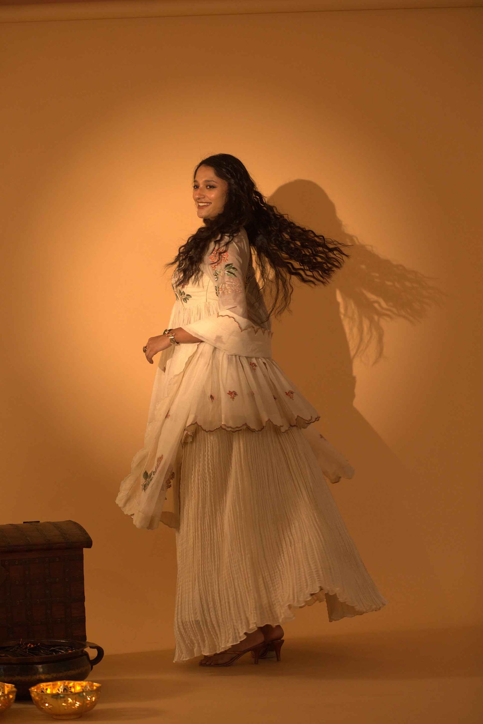 A Skirt Set With Embroidered Peplum And Duptta