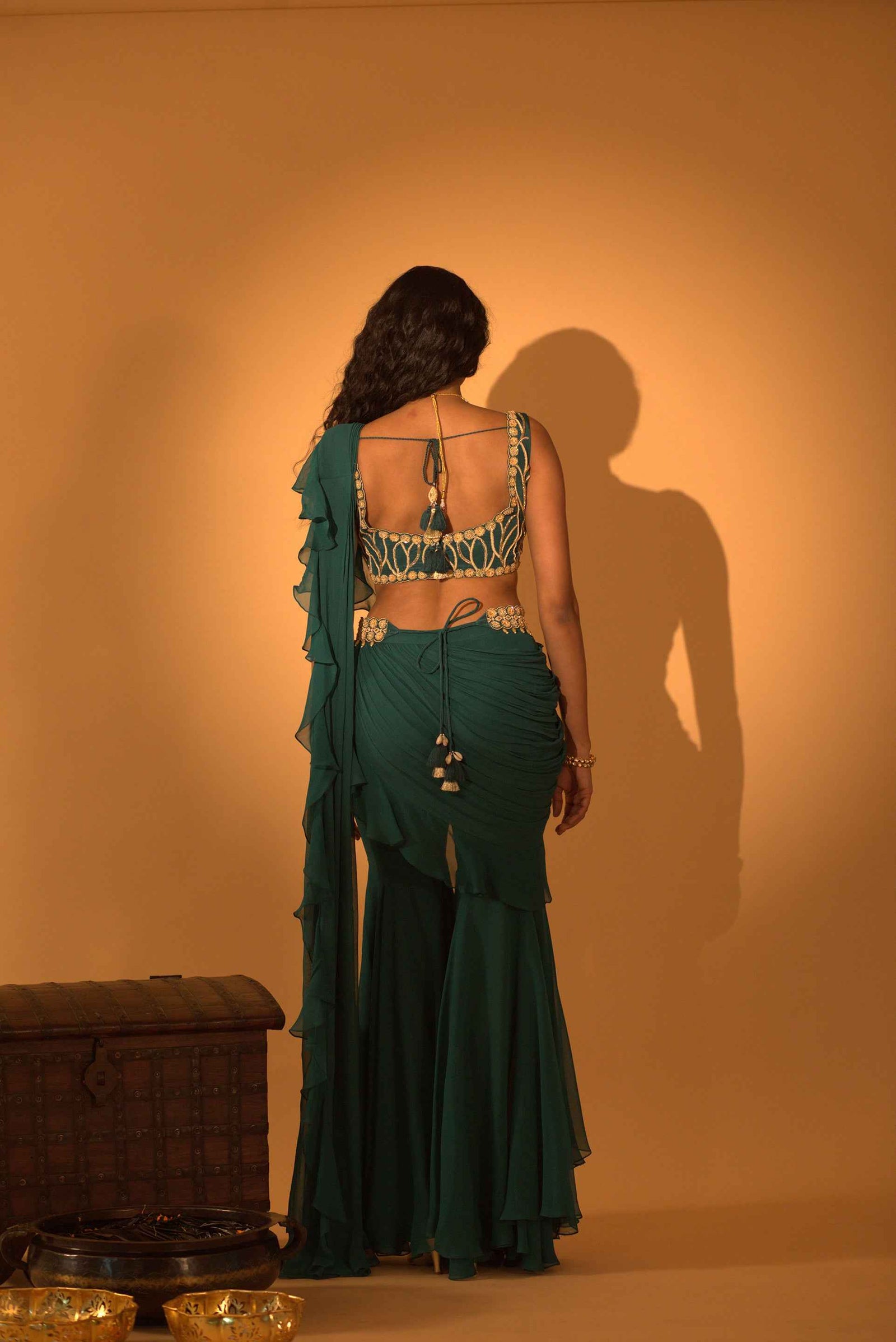 A Pre-Draped Saree Set Paired With Hand Embroidered Blouse And Belt
