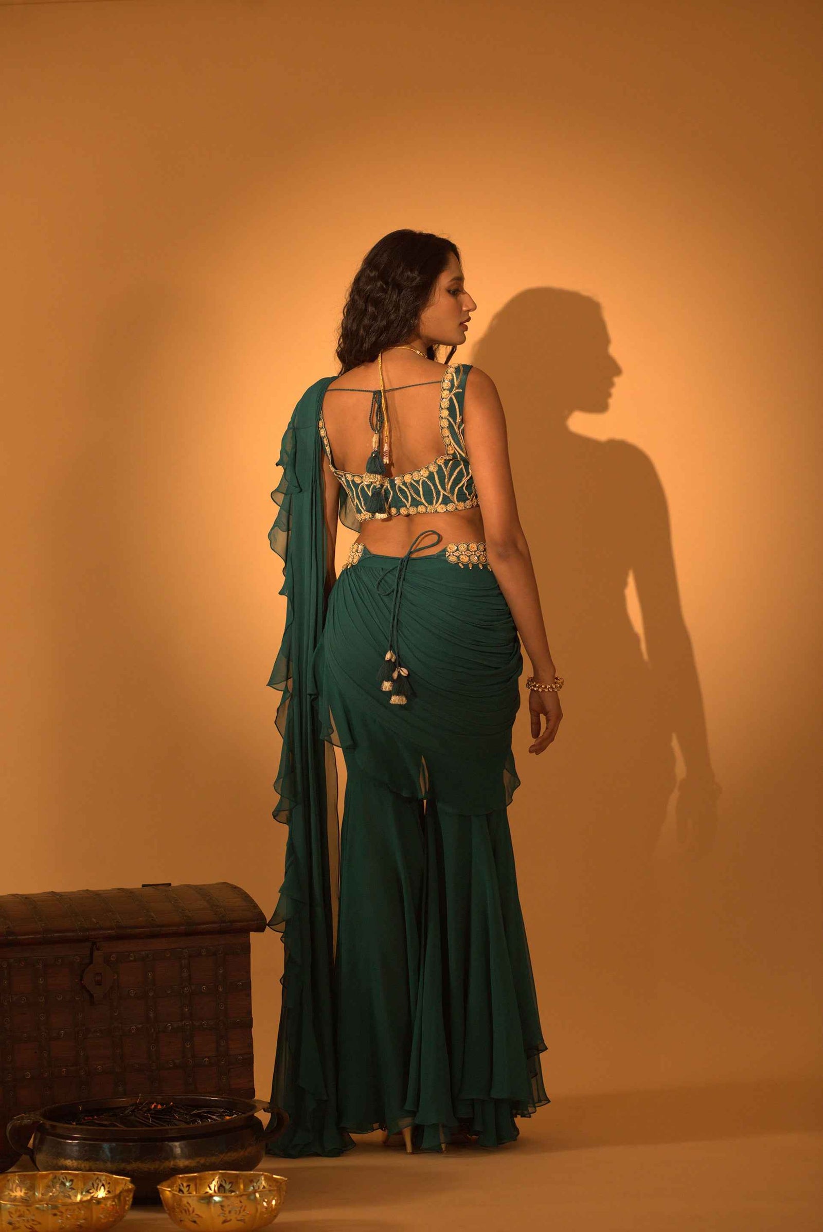 A Pre-Draped Saree Set Paired With Hand Embroidered Blouse And Belt