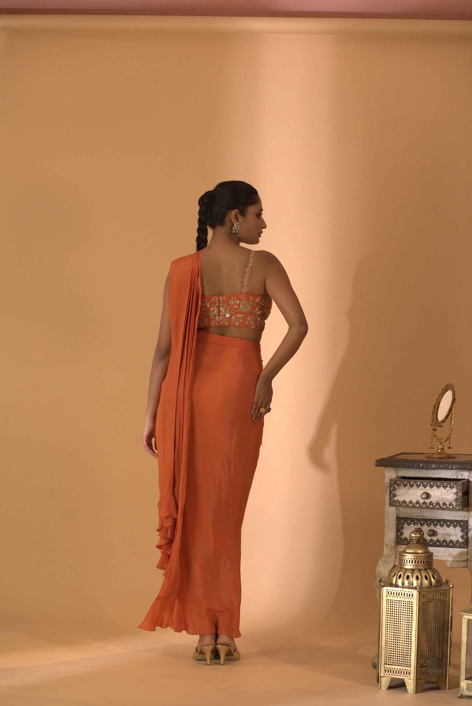 A Rust Pre-Draped Saree With Hand Embroidered Blouse
