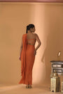 A Rust Pre-Draped Saree With Hand Embroidered Blouse