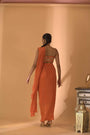 A Rust Pre-Draped Saree With Hand Embroidered Blouse