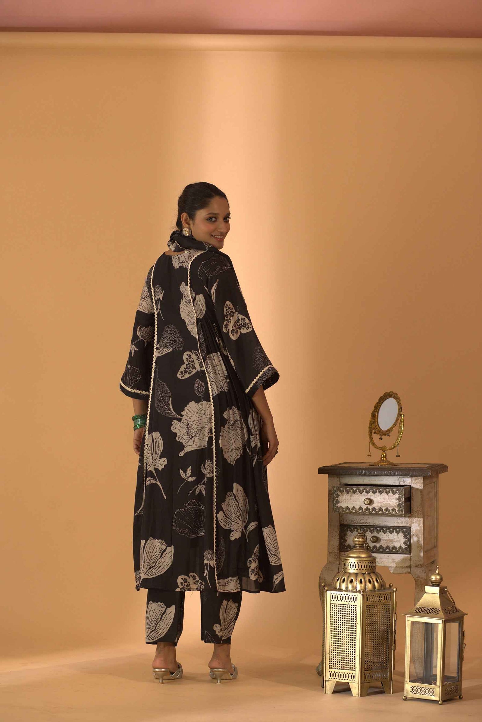 A Kurta Set Paired With Straight Pants And A Scarf