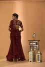 A Maroon Fish Cut Style Saree With Embroidered Blouse